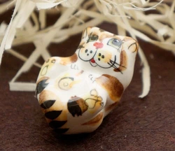 Фигурка керамическая Кіт на спині (колір)